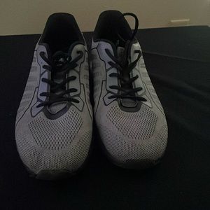Comfortable grey and black running shoes